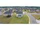 Aerial view of home showing the surrounding neighborhood and the spacious backyard at 615 Edgar St # 13, Hampton, GA 30228