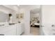 Bright bathroom featuring double sinks, modern fixtures, and an adjoining bedroom at 615 Edgar St # 13, Hampton, GA 30228