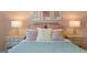 Chic bedroom with plush pillows, stylish lamps, and coordinated decor at 615 Edgar St # 13, Hampton, GA 30228