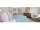 Serene bedroom with a cozy chair and a view of the closet at 615 Edgar St # 13, Hampton, GA 30228