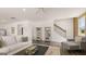 Bright living room showcasing modern decor, a comfortable sofa, and natural light from the nearby windows at 615 Edgar St # 13, Hampton, GA 30228