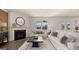 Inviting living room featuring a cozy fireplace, plush seating, and neutral tones for a relaxing atmosphere at 615 Edgar St # 13, Hampton, GA 30228