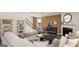 Inviting living room featuring a cozy fireplace, plush seating, and neutral tones for a relaxing atmosphere at 615 Edgar St # 13, Hampton, GA 30228