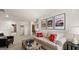 A living room is shown with neutral decor and comfortable seating at 615 Edgar St # 13, Hampton, GA 30228