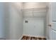 Laundry room with washer and dryer hookups and wire shelving at 6746 Lake Erie Ln, Fairburn, GA 30213