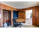 View of the kitchen area, adjacent to a living room and hallway at 2864 S 100 Hwy, Bowdon, GA 30108