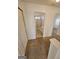 Hallway leading to bathroom featuring tile floors and shower and bath combination at 419 Kara Ln, Mcdonough, GA 30253