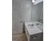 Bathroom featuring vanity with sink, tiled floors, and natural light enhancing the space at 419 Kara Ln, Mcdonough, GA 30253