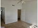 Bright bedroom with a ceiling fan and neutral carpet, ready for personalization at 419 Kara Ln, Mcdonough, GA 30253