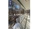 Inviting covered porch with white railings, perfect for relaxing and enjoying the outdoors at 2395 Peeksville Rd, Locust Grove, GA 30248