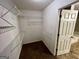Walk-in closet with wire shelving at 2395 Peeksville Rd, Locust Grove, GA 30248