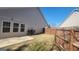 Fenced backyard with a concrete patio at 505 City Park Dr, Mcdonough, GA 30252