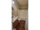 Bathroom featuring a vanity with granite countertop, a toilet and a shower/tub combination at 505 City Park Dr, Mcdonough, GA 30252