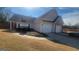 Charming single-Gathering home with two car garage, landscaped yard, and manicured lawn at 505 City Park Dr, Mcdonough, GA 30252