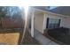 Exterior view of the front entrance of the home with a well-maintained lawn at 505 City Park Dr, Mcdonough, GA 30252