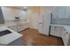 Well-lit kitchen featuring modern appliances and ample counter space at 505 City Park Dr, Mcdonough, GA 30252