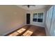 Bright sunroom with laminate floors, ceiling fan and multiple windows at 505 City Park Dr, Mcdonough, GA 30252