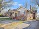 Charming brick home with a cozy front porch and traditional architectural details at 732 Cascade Sw Ave, Atlanta, GA 30310