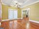 Spacious living room featuring hardwood floors, ceiling fan, and natural light at 732 Cascade Sw Ave, Atlanta, GA 30310