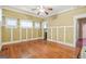 Inviting living room with hardwood floors, ceiling fan, and ample natural light at 732 Cascade Sw Ave, Atlanta, GA 30310