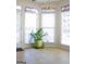Cozy breakfast nook with bright natural light, neutral walls and tile flooring at 613 Mountain Oaks Pkwy, Stone Mountain, GA 30087