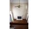 View of a living room featuring high ceilings, a fireplace, and hardwood floors at 613 Mountain Oaks Pkwy, Stone Mountain, GA 30087