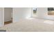 Spacious bedroom with neutral carpet and ample natural light at 984 Sutherland Ln # 31, Lawrenceville, GA 30043