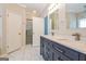 Beautiful bathroom with double sinks, modern fixtures, and a glass-enclosed shower for a luxurious feel at 1116 5Th Nw St, Atlanta, GA 30318