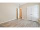 Inviting bedroom with luxury vinyl plank flooring, a closet, and ample natural light at 1116 5Th Nw St, Atlanta, GA 30318
