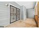 Covered porch with iron security door, offering a safe and private outdoor space at 1116 5Th Nw St, Atlanta, GA 30318