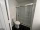Clean bathroom with tiled floor and modern glass-enclosed shower at 607 Tramore Ct, Stockbridge, GA 30281