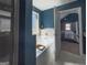 Bright bathroom with a soaking tub and doorway to the bedroom at 4205 Lindsey Way, Conyers, GA 30013