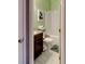 Cozy bathroom features a granite vanity, toilet, and a shower-tub combination with neutral-toned walls at 4205 Lindsey Way, Conyers, GA 30013