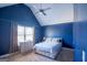 Bright bedroom features neutral carpeting, a sizable window, and a comfortable bed set against freshly painted walls at 4205 Lindsey Way, Conyers, GA 30013