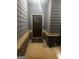 Welcoming front door entrance with sidelights and a brick lined landing at 4205 Lindsey Way, Conyers, GA 30013