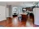 Spacious kitchen featuring an island with bar seating, stainless steel appliances, and dark wood cabinetry at 4205 Lindsey Way, Conyers, GA 30013