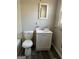 Clean bathroom features a white vanity, toilet, and shower/tub combination at 30 Lemon Pl, Mcdonough, GA 30253