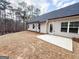 Spacious backyard featuring a concrete patio, providing a great outdoor space at 9178 Lakeview Pkwy, Villa Rica, GA 30180