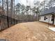 Fenced backyard offering privacy and a safe space with ample room for outdoor activities at 9178 Lakeview Pkwy, Villa Rica, GA 30180