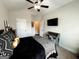 Neutral walls and carpet floors make this bedroom cozy at 9178 Lakeview Pkwy, Villa Rica, GA 30180