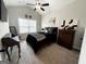 Neutral walls and carpet floors make this bedroom cozy at 9178 Lakeview Pkwy, Villa Rica, GA 30180