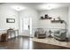 Inviting foyer with hardwood floors, elegant decor, and ample natural light at 9178 Lakeview Pkwy, Villa Rica, GA 30180