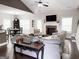 Spacious living room with vaulted ceiling, fireplace, and elegant furnishings at 9178 Lakeview Pkwy, Villa Rica, GA 30180