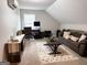 Inviting living area with a cozy sofa, desk, and natural light, ideal for relaxation and productivity at 9178 Lakeview Pkwy, Villa Rica, GA 30180