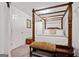 Charming bedroom with a four poster bed and neutral color scheme at 2271 Rolling Trl, Lithonia, GA 30058