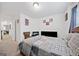 A cozy bedroom with neutral carpet and a clean, minimalist design at 2271 Rolling Trl, Lithonia, GA 30058