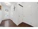 Bright hallway featuring hardwood floors and white trim at 2271 Rolling Trl, Lithonia, GA 30058