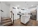 Stylish white kitchen with stainless steel appliances and a center island at 2271 Rolling Trl, Lithonia, GA 30058