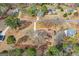 Neighborhood aerial view featuring lush greenery, mature trees and various housing styles at 210 Heritage Cir, Mcdonough, GA 30253