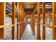Unfinished basement showing wooden framework and concrete flooring, presenting customization potential at 210 Heritage Cir, Mcdonough, GA 30253